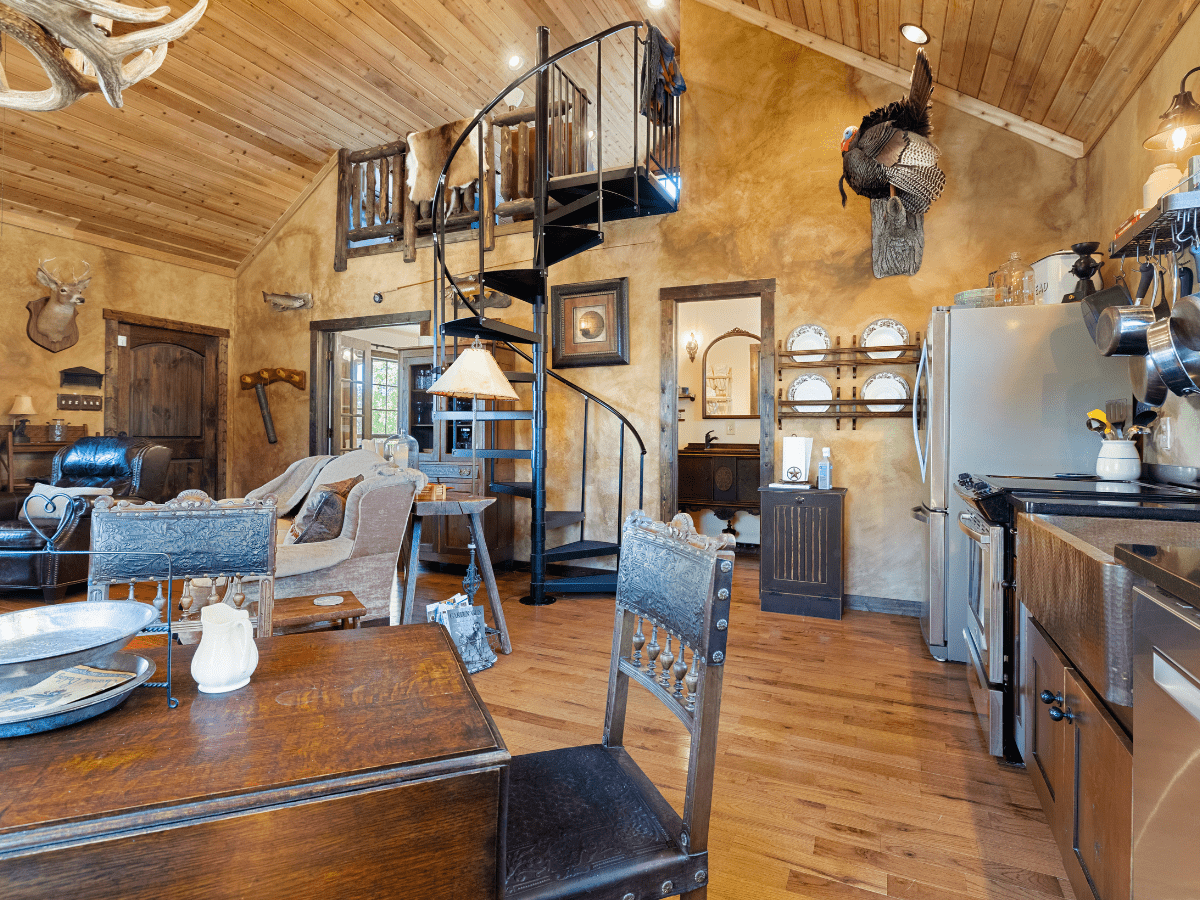 Image of breakfast table and kitchen in Cabin at Inn at Sunset Mill ranch