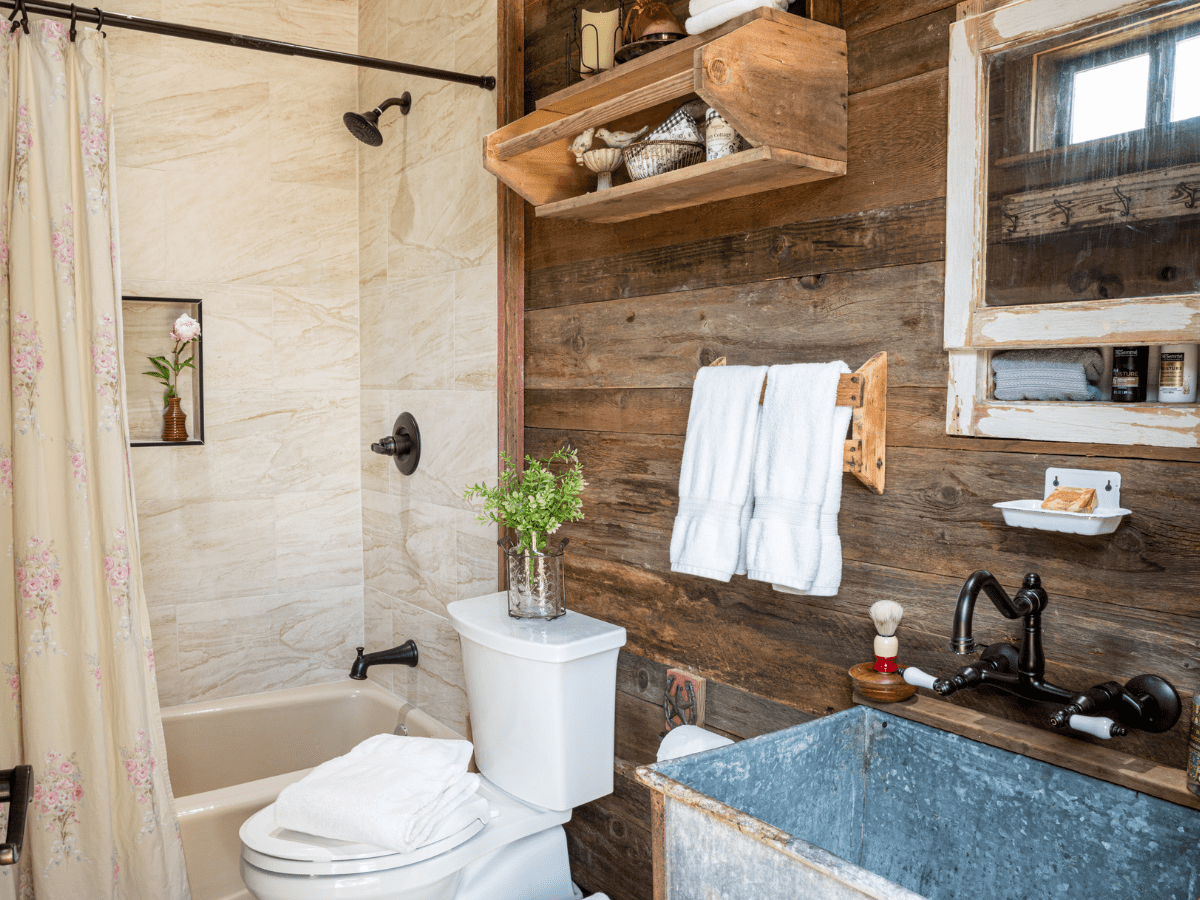 Image of metal sink basin and magnolia home style bathroom in texas hill country