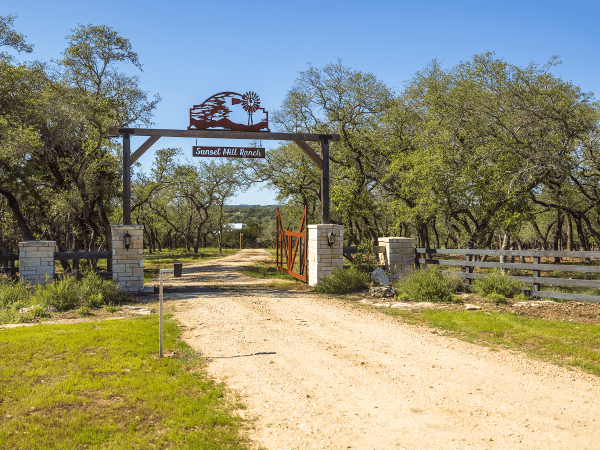 Image of gated entrance at Inn at Sunset Mill Ranch in Wimberley Texas