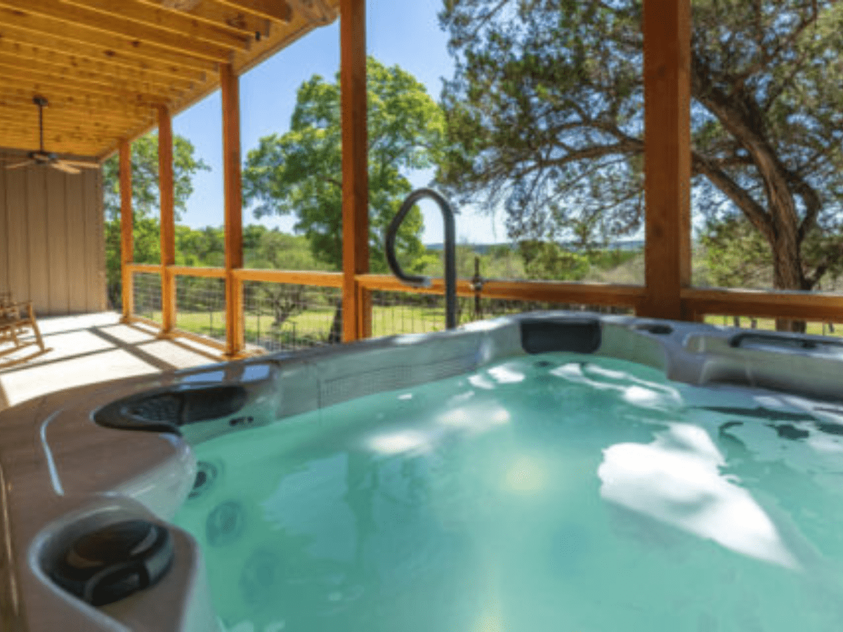 Inn_at_Sunset_Mill_Ranch_Wimberley_Hotel_mill_room (3) - Inn at Sunset Mill Ranch Image of Hot Tub on Deck of Carriage House lodging accommodations at Inn at Sunset Mill Ranch