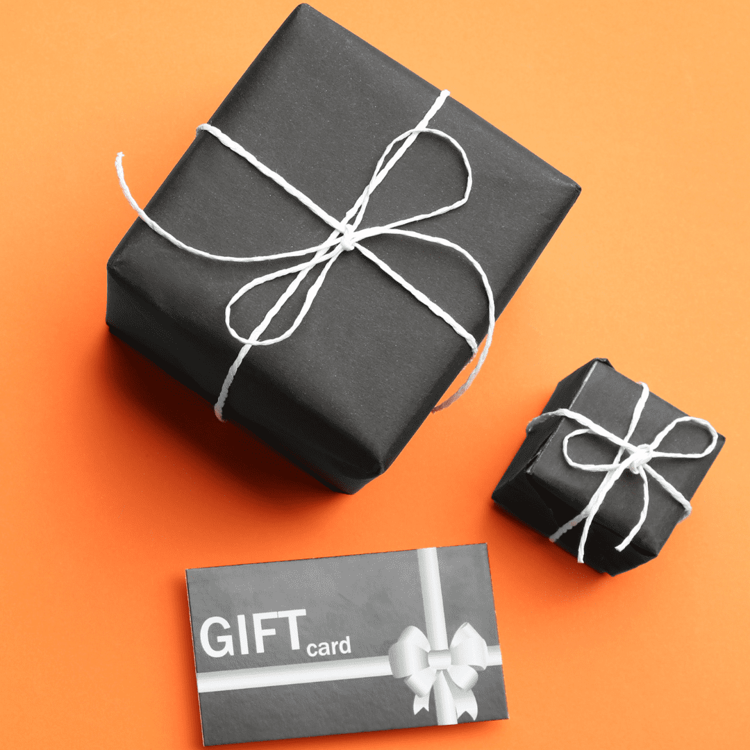 Inn_at_sunset_mill_Ranch_Texas_hill_country_Lodging - Inn at Sunset Mill Ranch Image of two black gift boxes with white ribbon and gift card