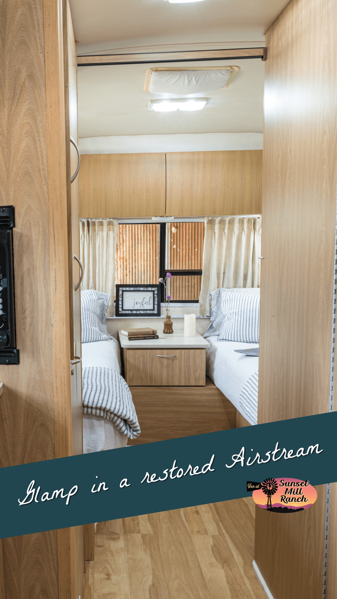 airstream - Inn at Sunset Mill Ranch Image of inside of airstream glamper from kitchen looking into bedroom