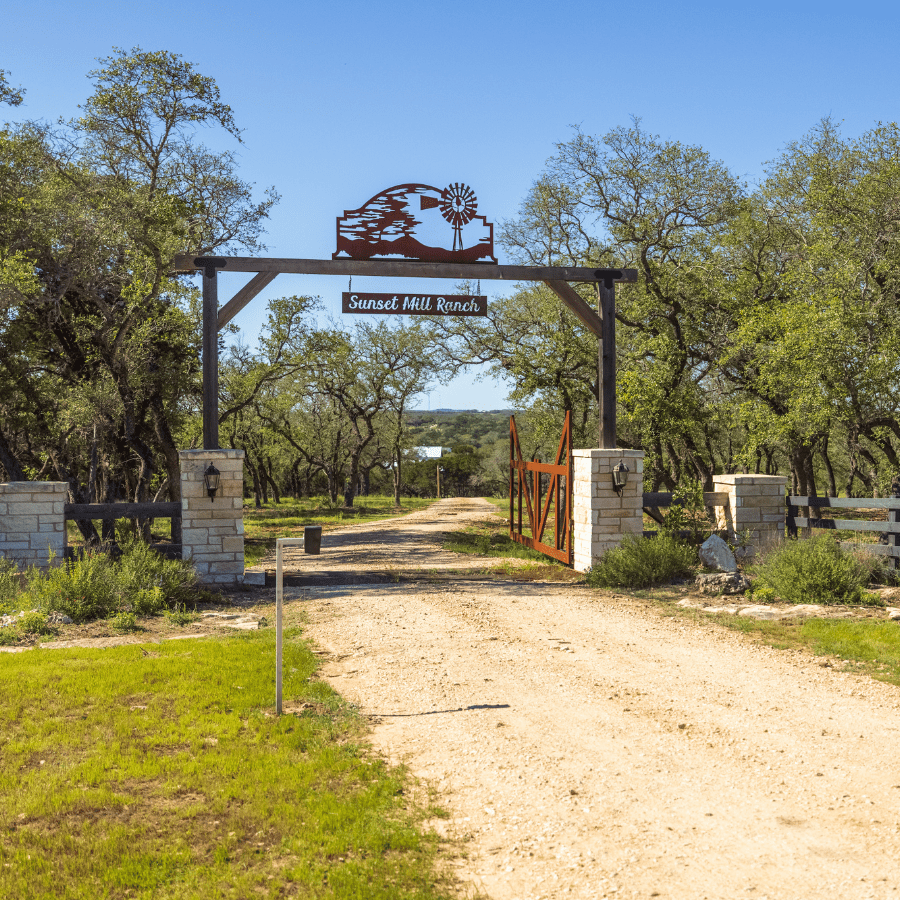 Image of gated entrance at Inn at Sunset Mill Ranch in Wimberley Texas