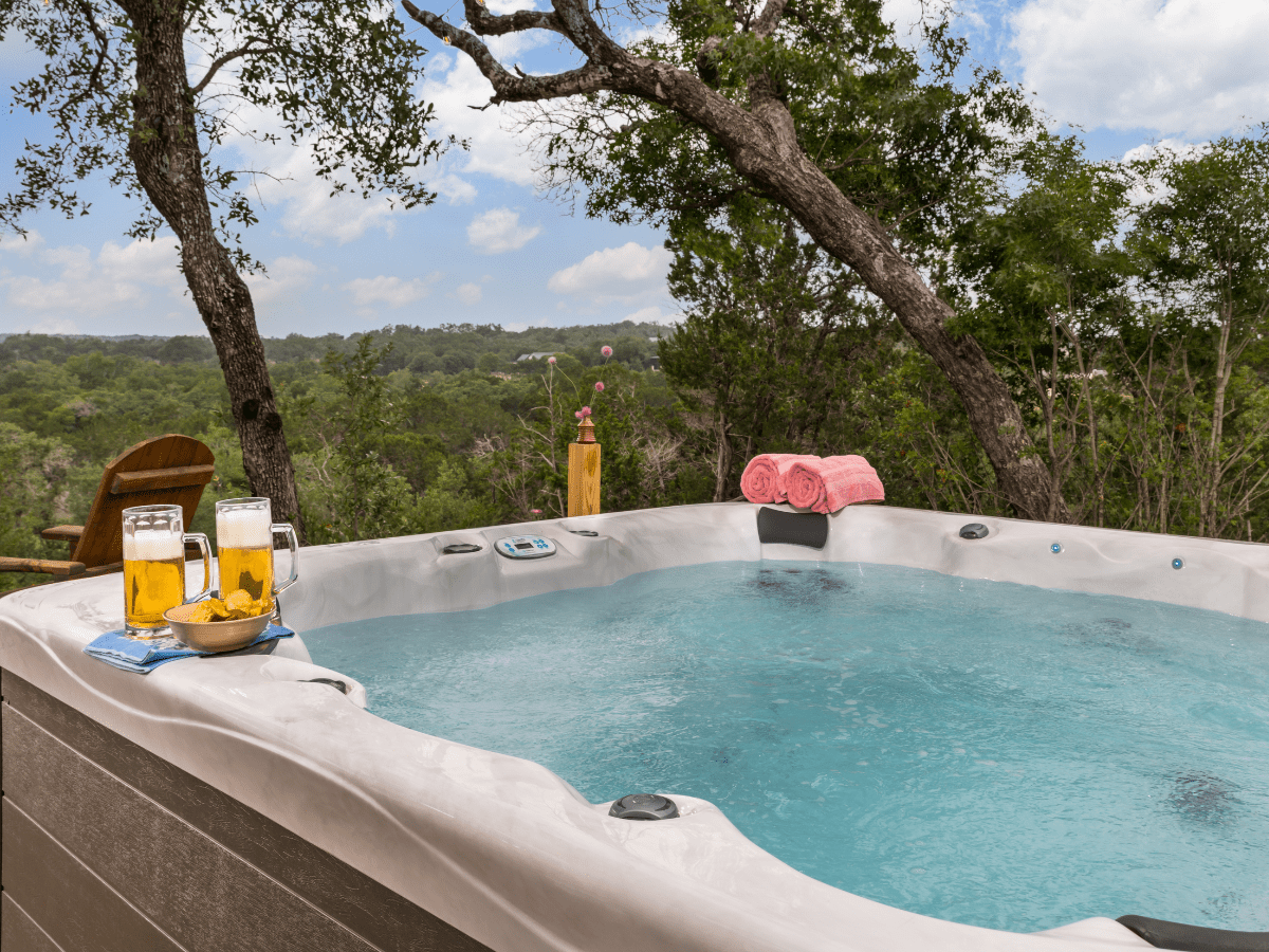 Inn_at_Sunset_Mill_Ranch_Wimberley_Hotel_hot_tub - Inn at Sunset Mill Ranch Image of hot tub on deck in texas hill country