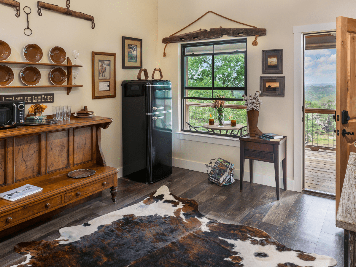 Inn_at_Sunset_Mill_Ranch_Wimberley_Hotel_tack_room 2 - Inn at Sunset Mill Ranch Image of common room with coffee station at wimberley lodging inn at sunset mill ranch