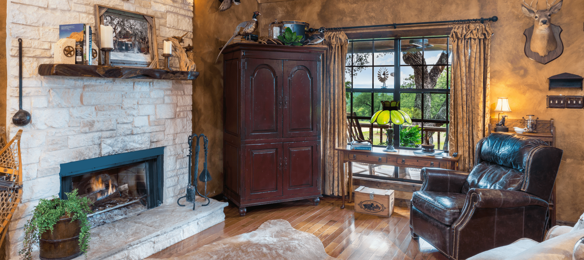 Image of fireplace and chair at Inn at Sunset Mill Ranch