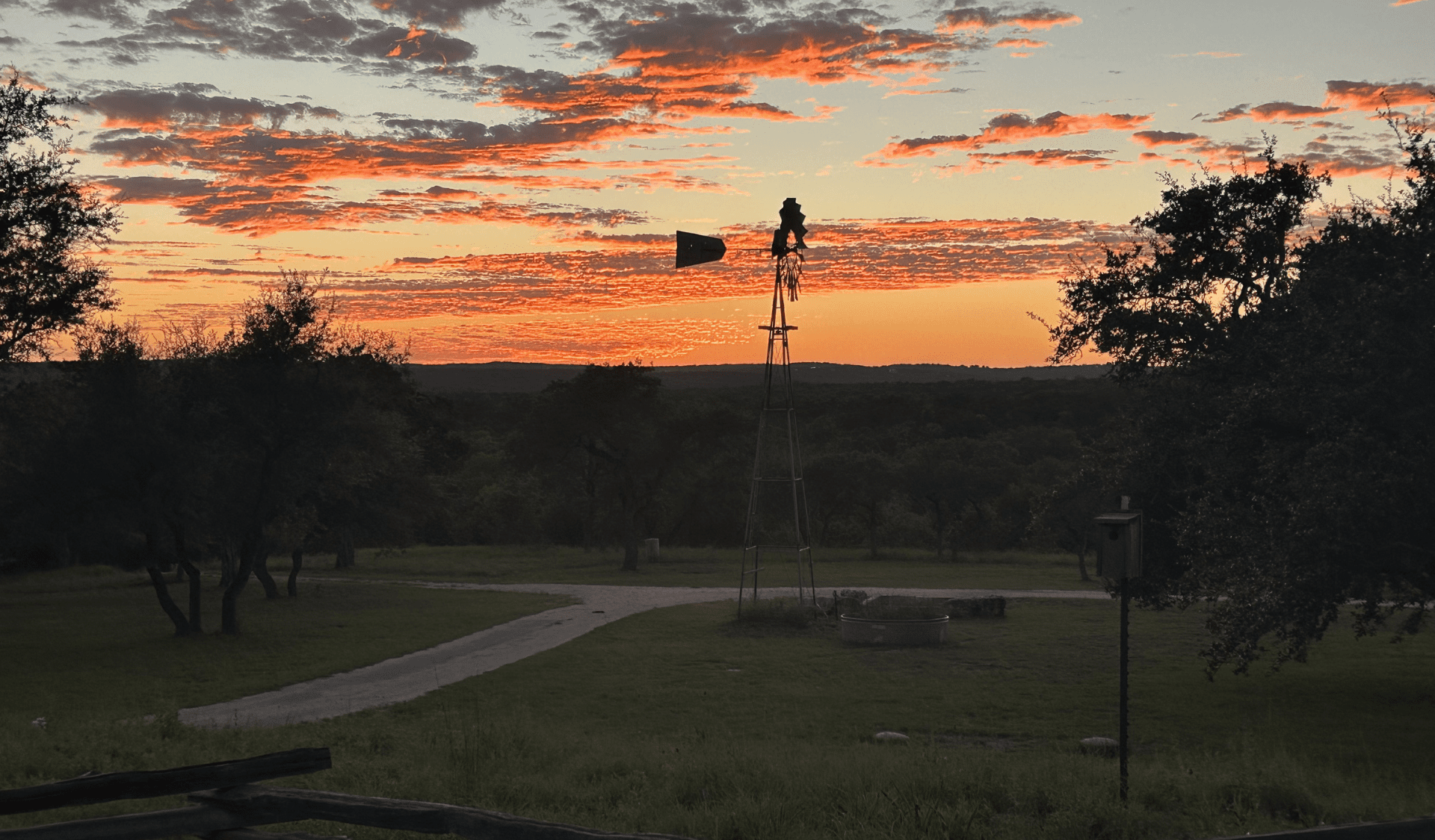 Image of fiery sunset in Texas Hill Country at Inn at Sunset Mill Ranch